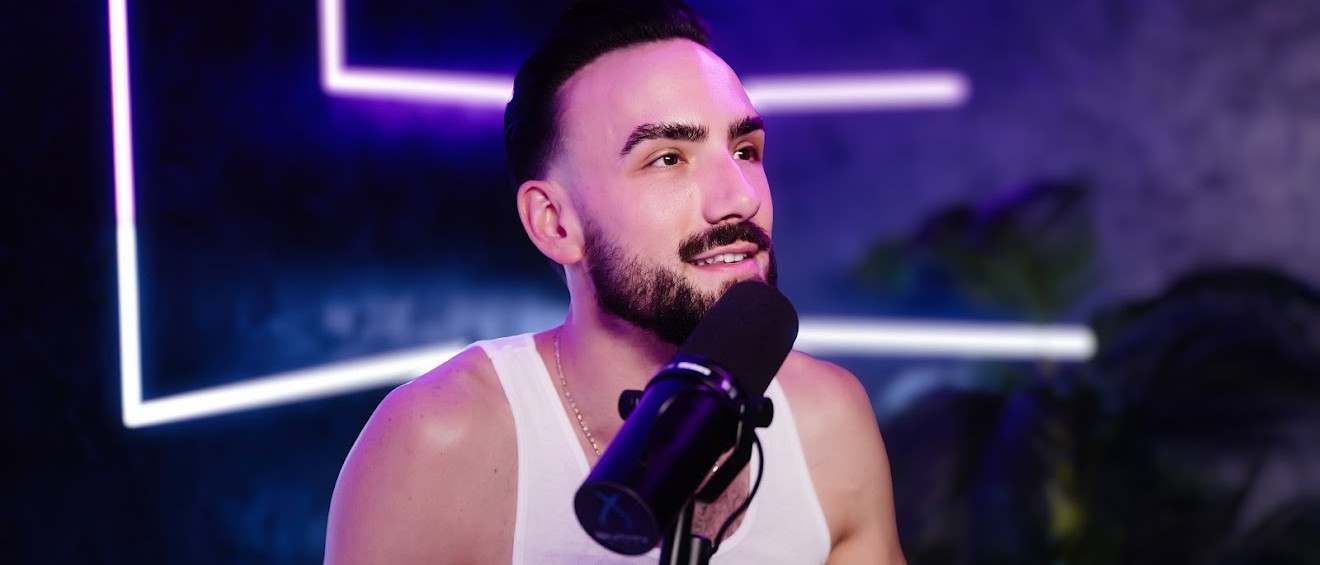 Colin Bedell on set with microphone
